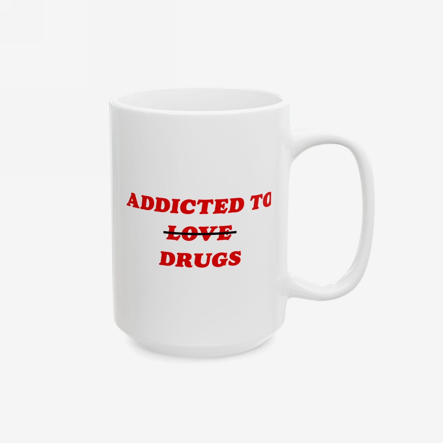 Ceramic mug with red text ADDICTED TO ~~LOVE~~ DRUGS reflecting humor and mental health themes. Ideal for those embracing honesty and chaos. Ships from EU, supports Amnesty International.