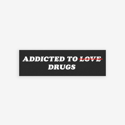 Addicted To Love / Drugs Sticker & Magnet featuring bold text with Love crossed out, available as durable vinyl sticker or magnet.