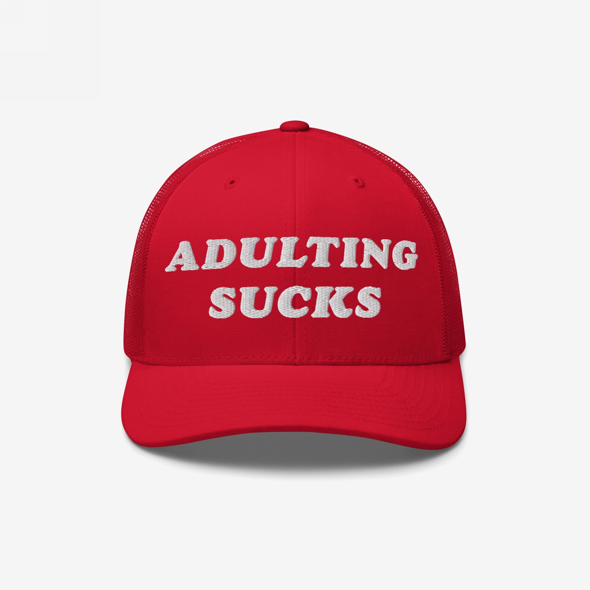 Adulting Sucks Hat with bold embroidery captures youthful defiance, ideal for expressing frustration with adult life. Features a vintage-inspired design with a mesh back, perfect for casual wear or gifting.