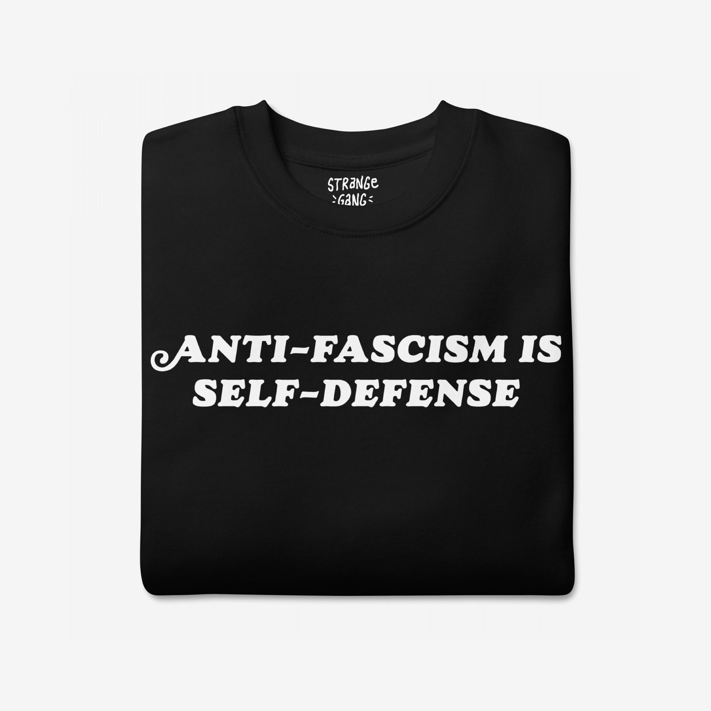 “Anti-Fascism Is Self-Defense” Hoodie & Sweatshirt featuring bold white lettering on black fabric, conveying a powerful message. Ideal for advocates, combining comfort with activism.