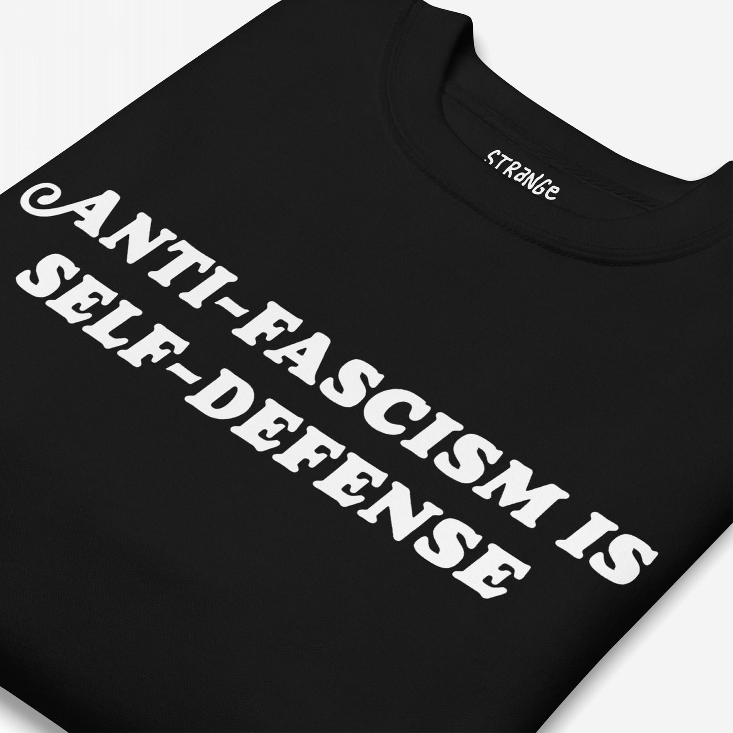 Anti-Fascism Is Self-Defense Hoodie & Sweatshirt folded, showcasing a bold message 'ANTI-FASCISM IS SELF-DEFENSE' in white across the chest, embodying a strong statement against hate and promoting equality.