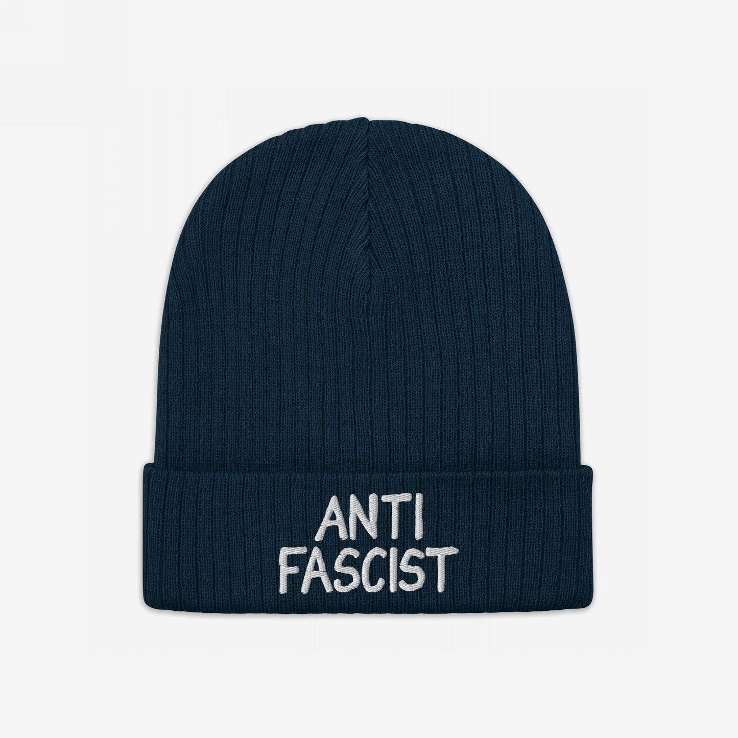 Dark-blue rib-knit beanie with “ANTI FASCIST” embroidered in white on the cuff, embodying protest spirit and ethical fashion.