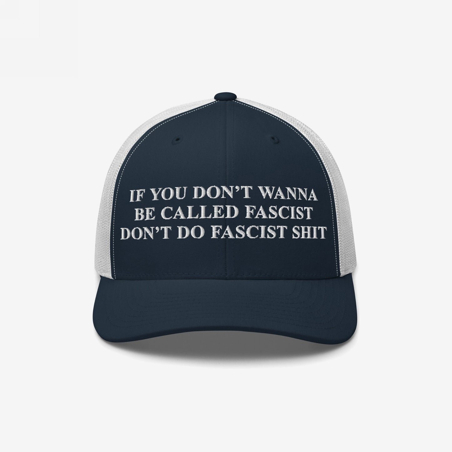 Anti-Fascist Retro Hat featuring bold white embroidery with the phrase, If you don’t wanna be called fascist, don’t do fascist shit, on a mesh trucker-style cap, promoting resistance and equality.