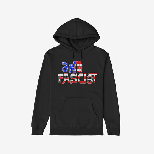 Black hoodie featuring the Anti Fascist USA Shirt graphic, with a distressed American flag motif. Designed for activism and progressive resistance, echoing themes of equality and anti-fascism.