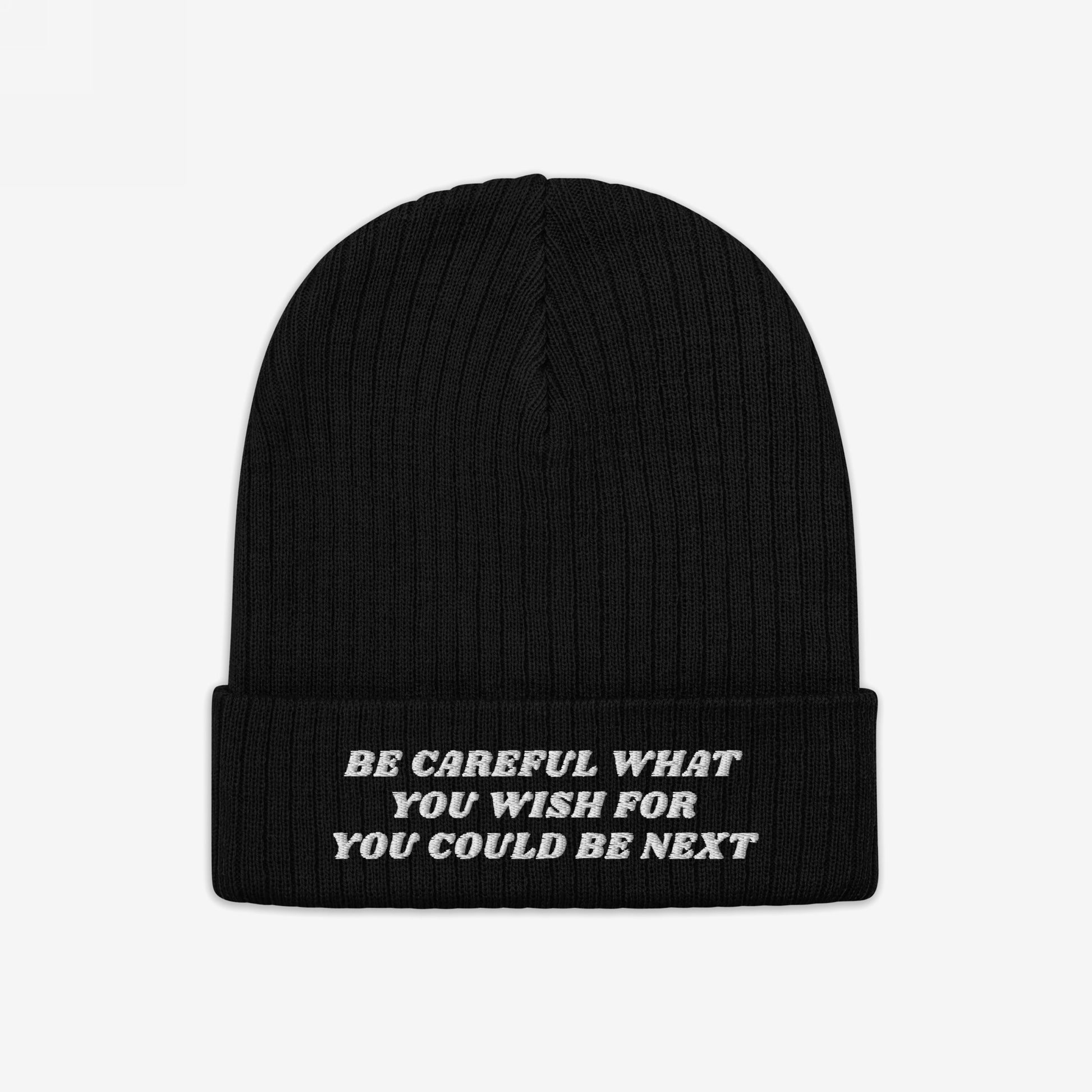 Black rib-knit cuffed beanie featuring white embroidery with the text Be Careful What You Wish For You Could Be Next, aligning with anti-fascist and progressive activism themes, supporting ACLU.