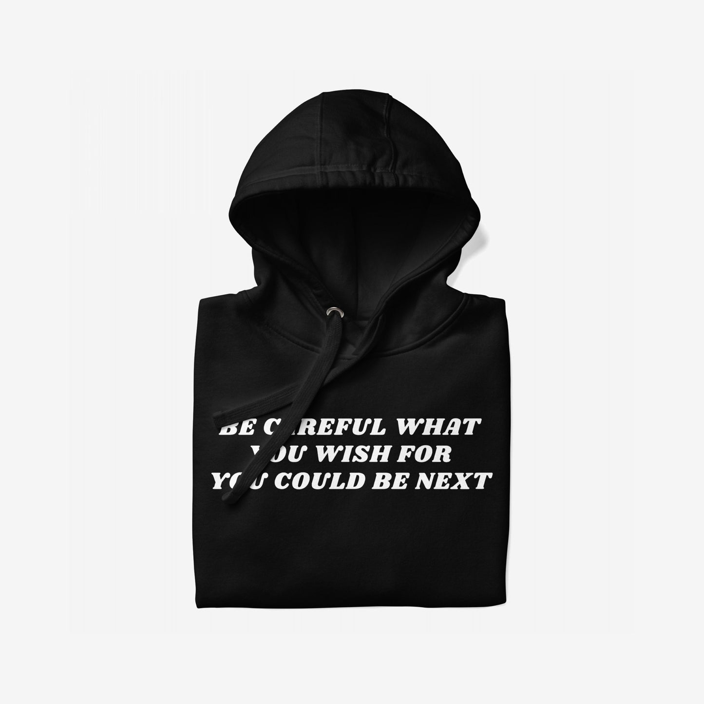The Be Careful Hoodie & Sweatshirt features bold white text on a black fleece, advocating resistance and awareness with a Y2K rebellious vibe, challenging authoritarianism and fearmongering.