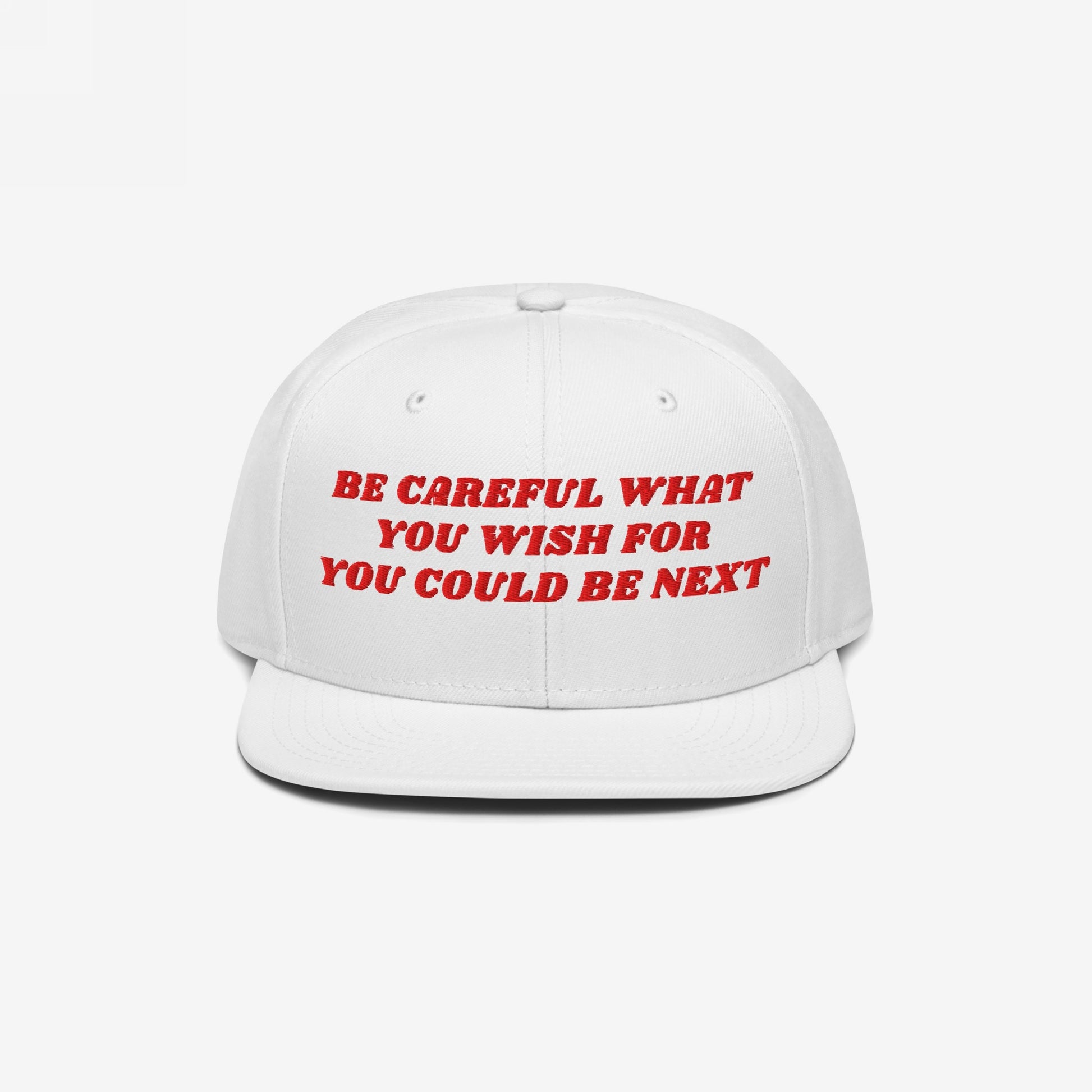 White snap-back baseball cap featuring bold red embroidered text: Be careful what you wish for, you could be next. Perfect for progressive activists, this Be Careful Hat delivers a strong political statement.