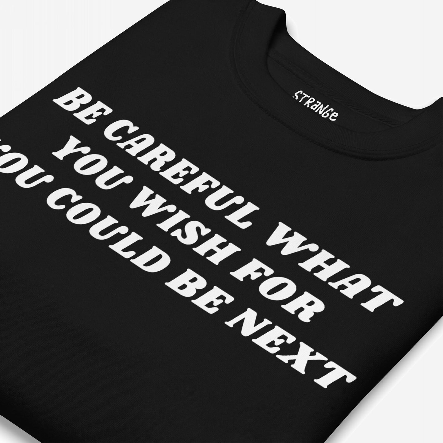 Black T-shirt with bold white slogan “Be careful what you wish for, you could be next.” The Be Careful Hoodie & Sweatshirt channels modern rebellion, challenging authoritarianism and fearmongering.