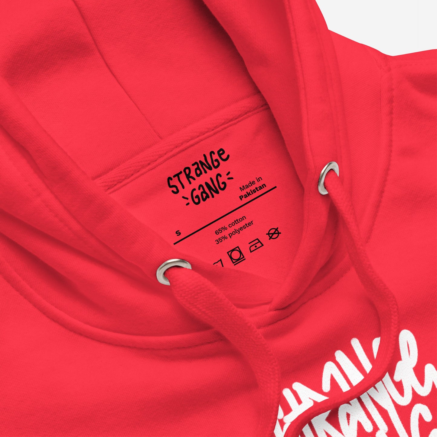 Born To Fight Against Fascism Graffiti Hoodie features red fabric with drawstrings and metal eyelets, showcasing inner label details and a glimpse of bold screen-printed lettering, exuding rebellious style.