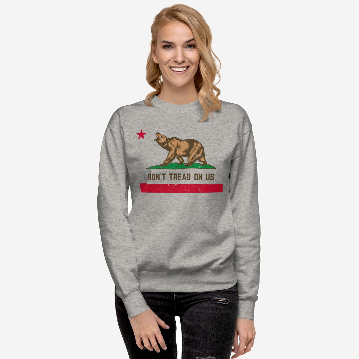 California Gadsden Flag Hoodie & Sweatshirt features a stylized bear on grass with a red star, DON’T TREAD ON US text, and distressed stripe, embodying anti-authoritarian spirit.