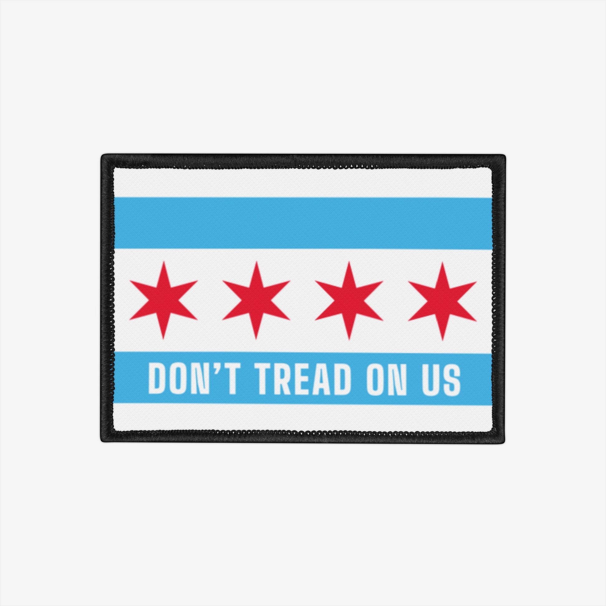Chicago Gadsden Flag Patch: Rectangular embroidered patch featuring Chicago's flag with DON’T TREAD ON US slogan, symbolizing resistance and civic justice. Iron-on, 3.5 x 2.5 polyester with black edges.