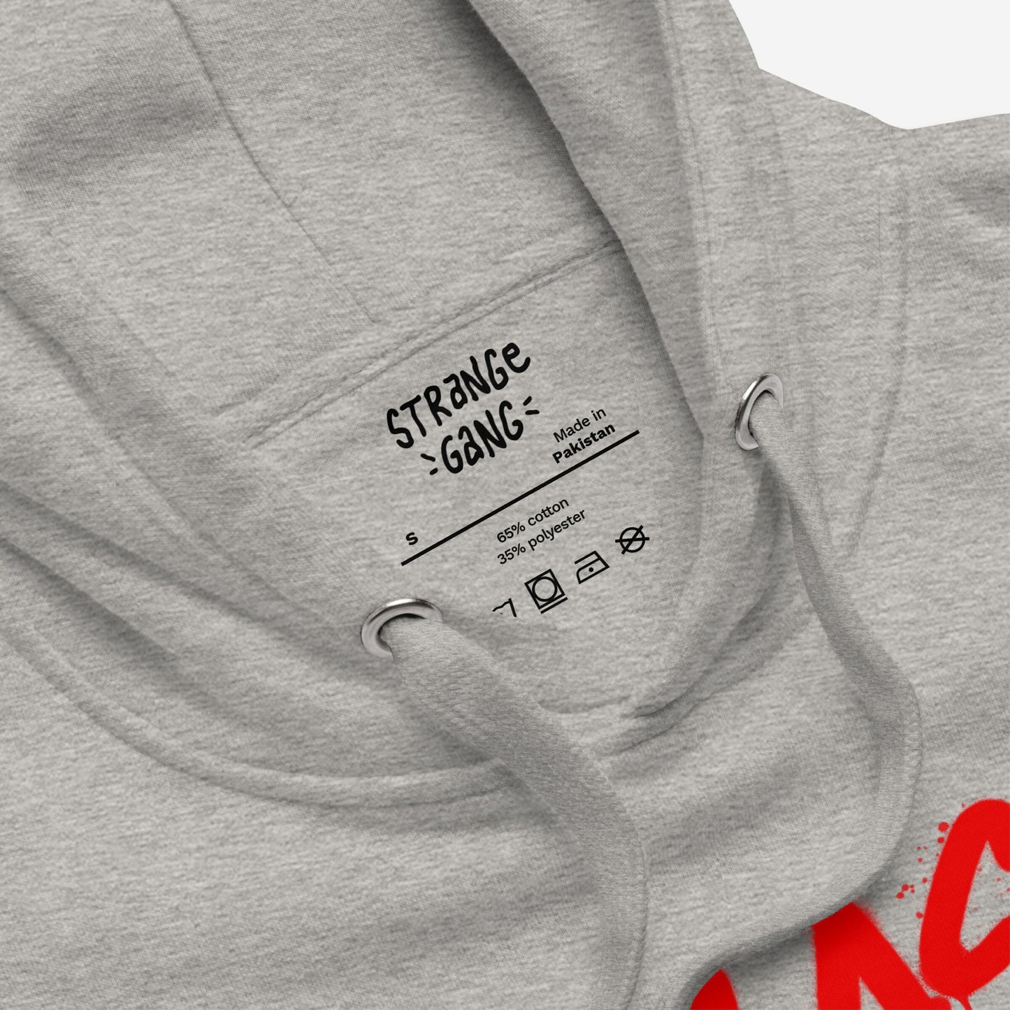 Close-up of the Class War Hoodie, showing the interior screen-printed label, metal eyelets, and drawstrings, emphasizing its raw, activist design with Class War scrawled over Culture War.