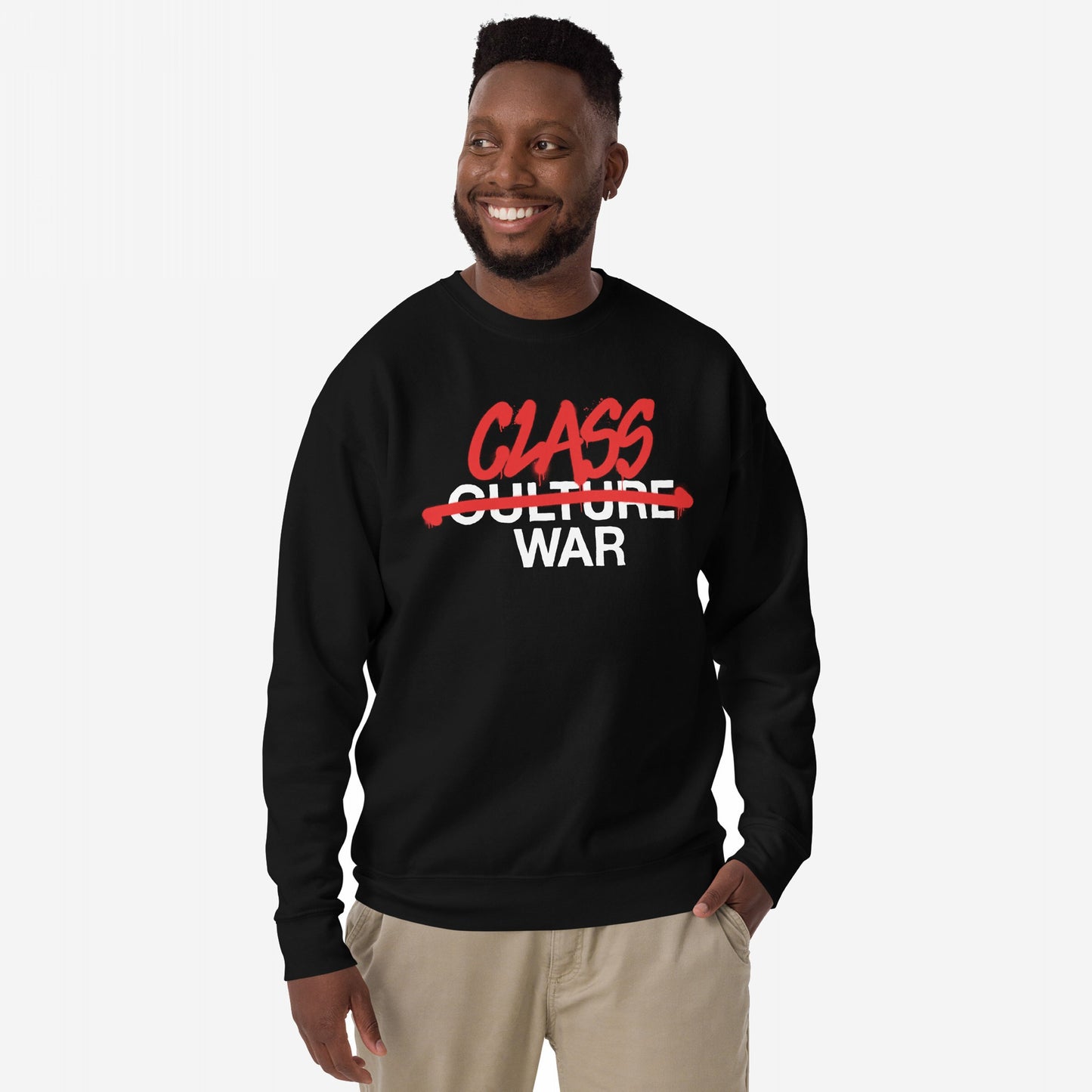 Man modeling the Class War Hoodie & Sweatshirt, featuring bold Class War slogan in graffiti style, striking through Culture War, embodying a message of socio-political awareness and activism.