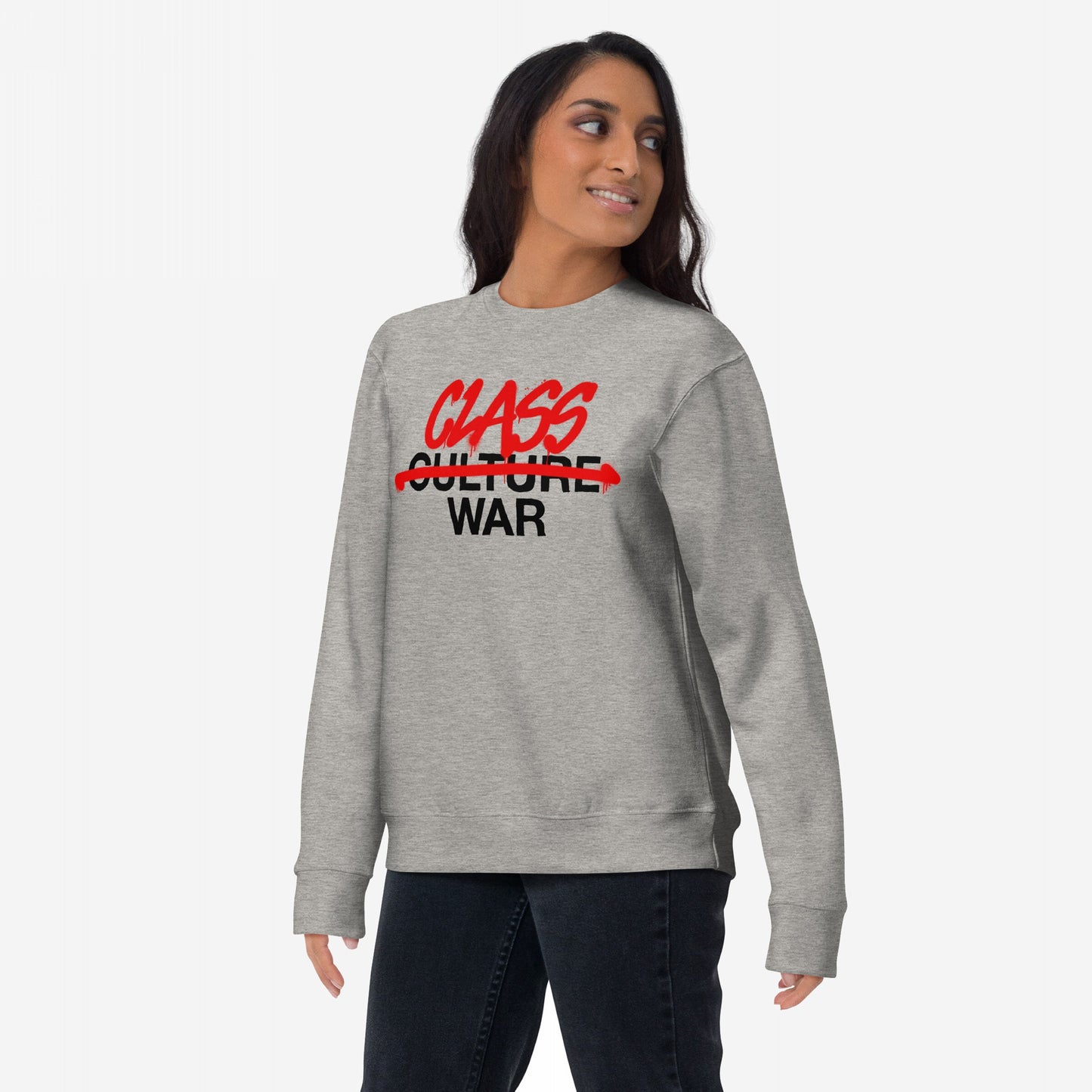 Young woman models the Class War Hoodie & Sweatshirt, featuring Class War in bold red script over crossed-out Culture and WAR below, symbolizing resistance and advocacy for social justice.