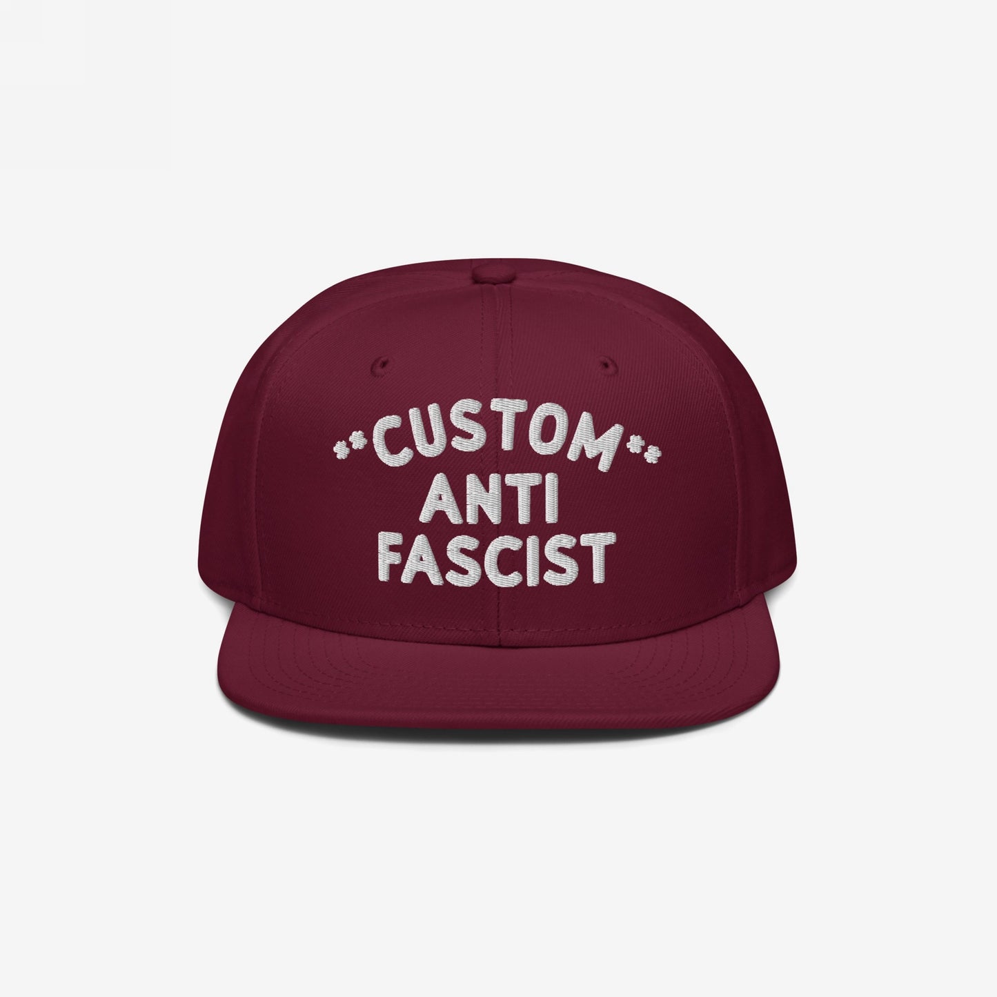 Custom Anti-Fascist Snapback Hat with white embroidered text Custom Anti Fascist on front, designed for personalization. This structured, adjustable cap blends style and a bold anti-fascist message.