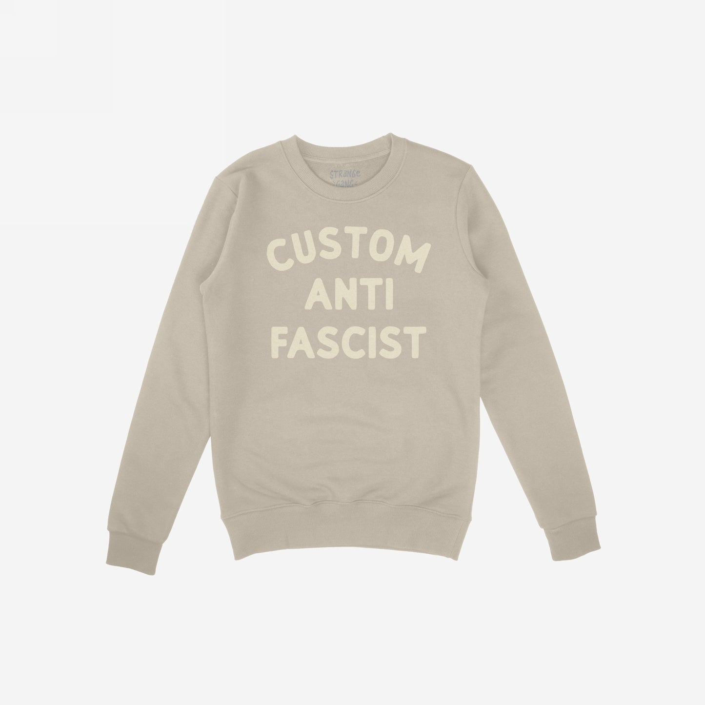 Custom Anti-Fascist Sweatshirt featuring bold off-white block letters on a light-beige crewneck. Personalize the Custom text to express your values and make a statement against fascism.