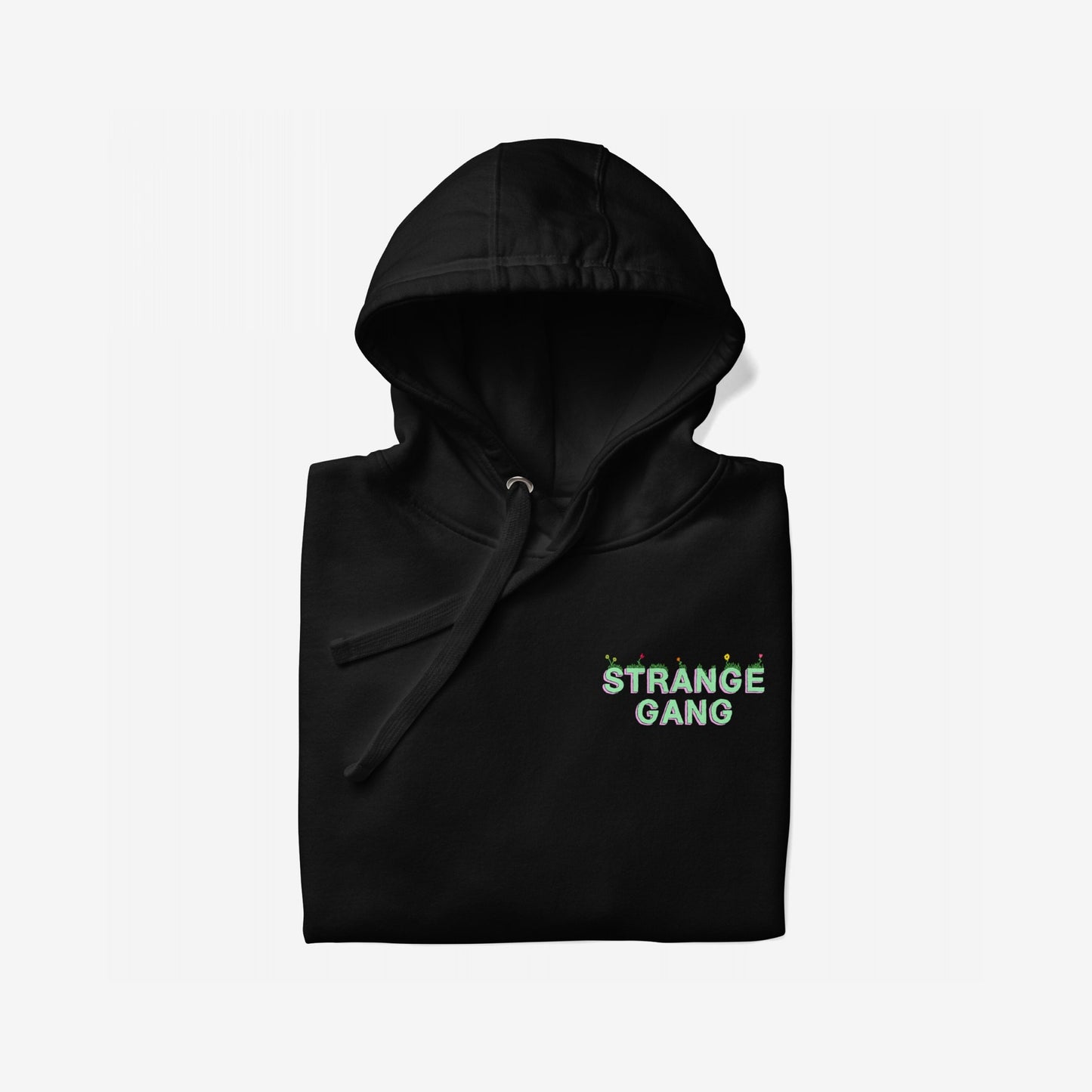 Don't Join A Cult Hoodie features bold light-green letters outlined in pink on the front, promoting critical thinking. The folded black pullover with a hood embodies a stand against blind loyalty.