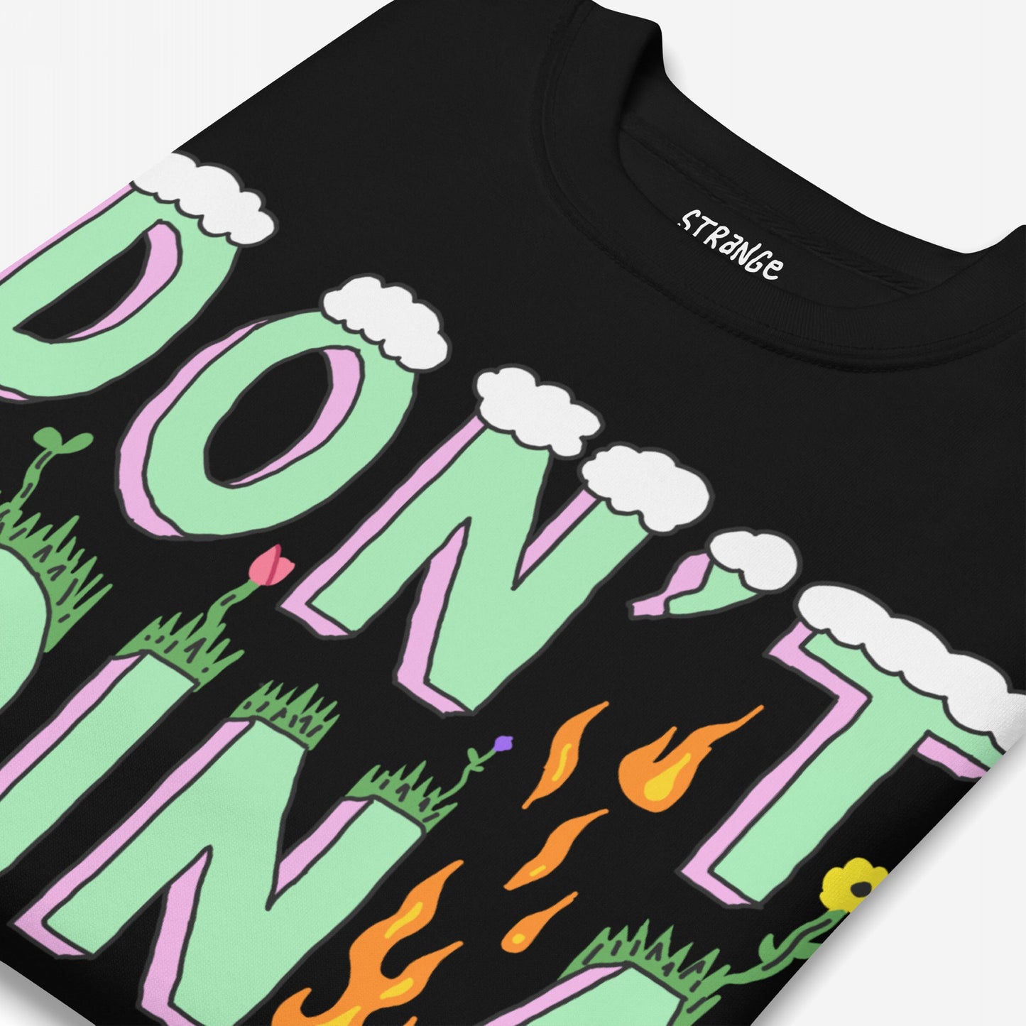 Don't Join A Cult Hoodie & Sweatshirt features a bold, mint-green and pink graphic with cloud accents, grass, flowers, and flames, symbolizing resistance against groupthink and authoritarianism.