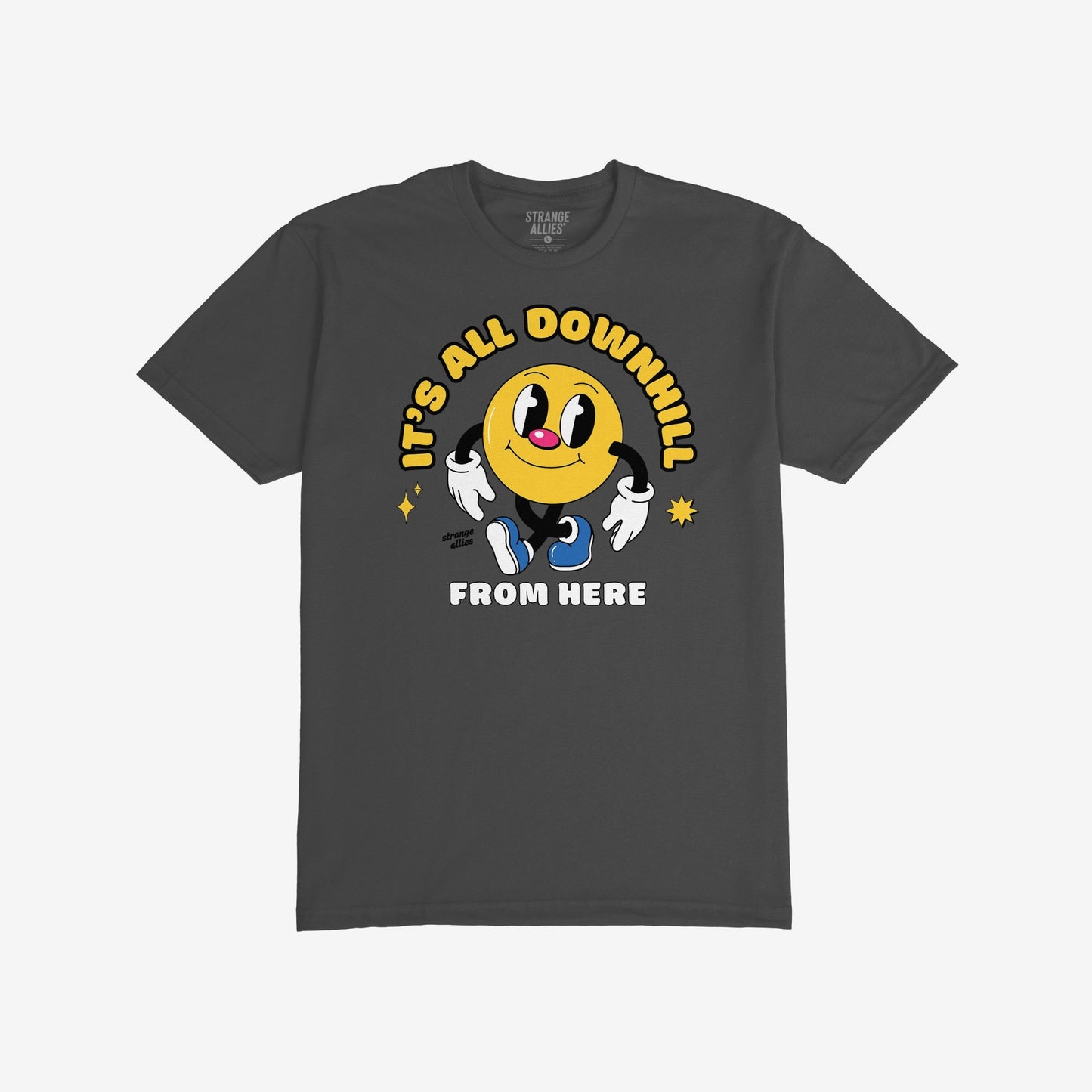 Downhill T-shirt features a cheerful yellow smiley character with gloved hands and sneakers, accompanied by the slogan “IT’S ALL DOWNHILL FROM HERE,” capturing a blend of humor and resignation.
