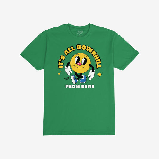 Downhill T-shirt features a retro-style graphic of a cheerful yellow circle character with big eyes, white gloves, and blue sneakers, surrounded by playful text and sparkles, embodying charming defiance.