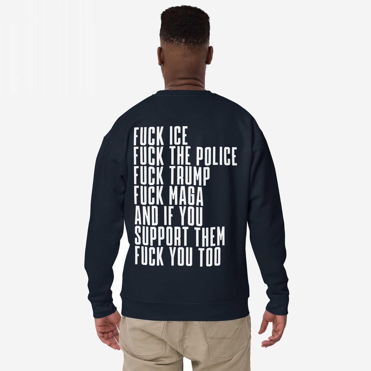 Person seen from behind wearing the Fuck 'Em All Back Print Hoodie & Sweatshirt with bold protest text against ICE, police, Trump, and MAGA. A powerful statement piece challenging fascism and oppression.