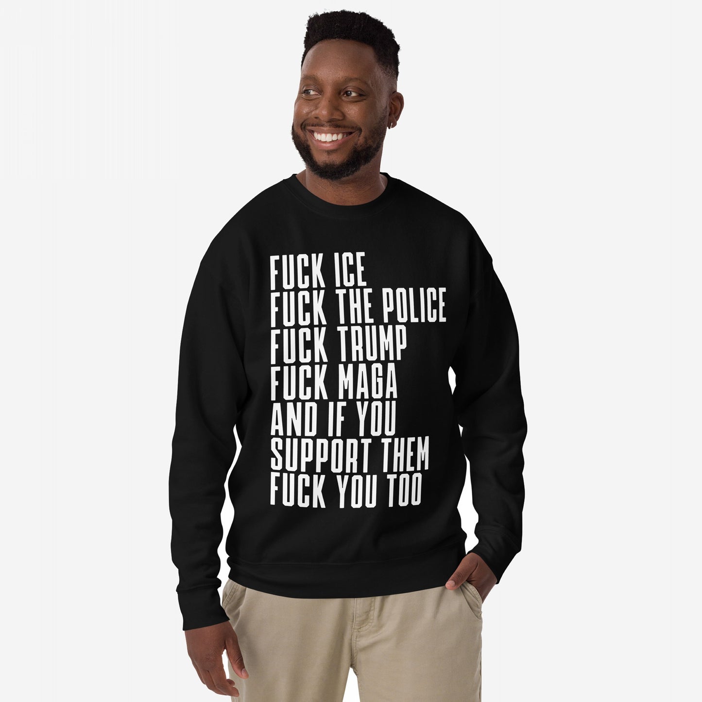 Smiling man wears the Fuck 'Em All Sweatshirt, featuring bold white text condemning ICE, police, Trump, MAGA, and supporters. A statement piece for those passionately opposing injustice.