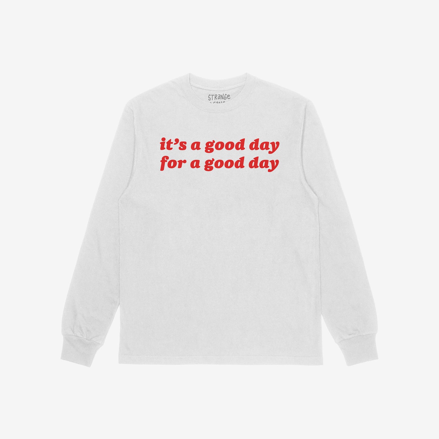 Good Day Shirt featuring bold red text “it’s a good day for a good day” on a white long-sleeve, embodying positivity and vintage vibes, laid flat against a white backdrop.