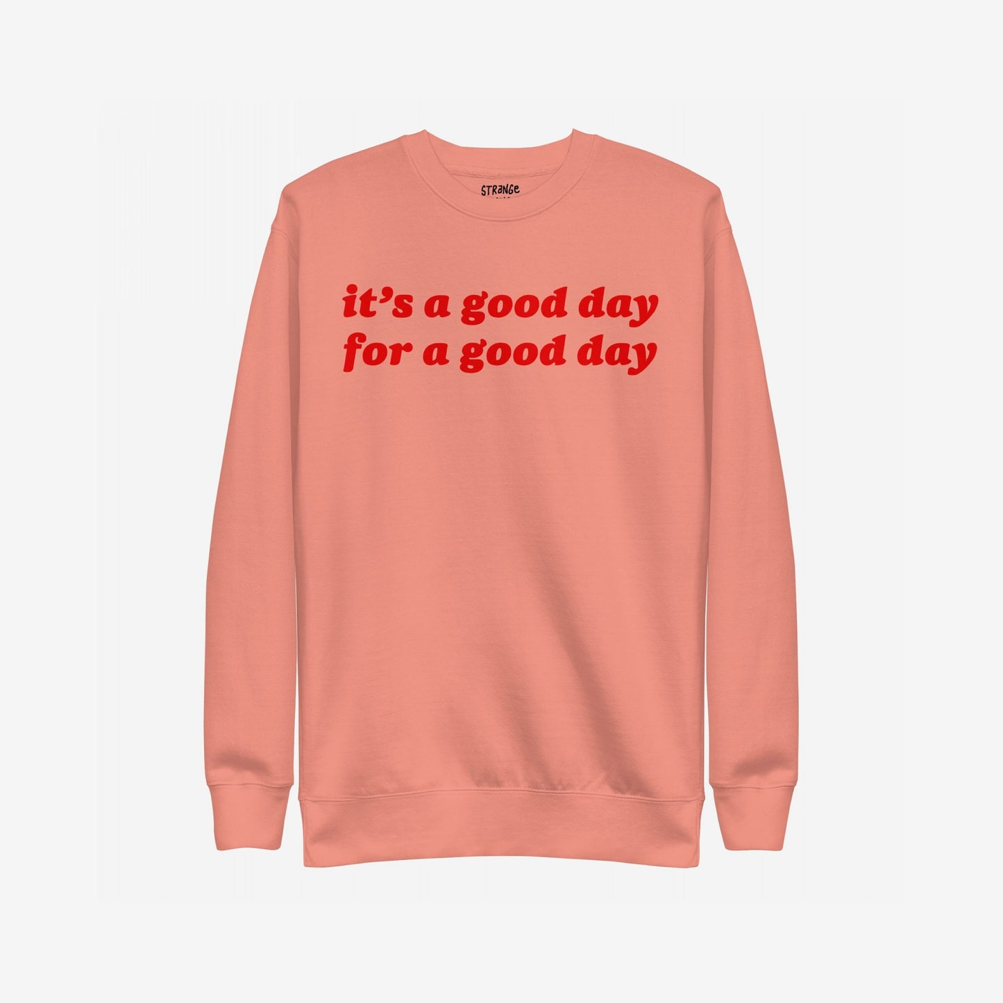 Good Day Hoodie & Sweatshirt features a soft-peach crewneck with bold red lettering, “it’s a good day for a good day,” offering comfort and positivity in a retro style.
