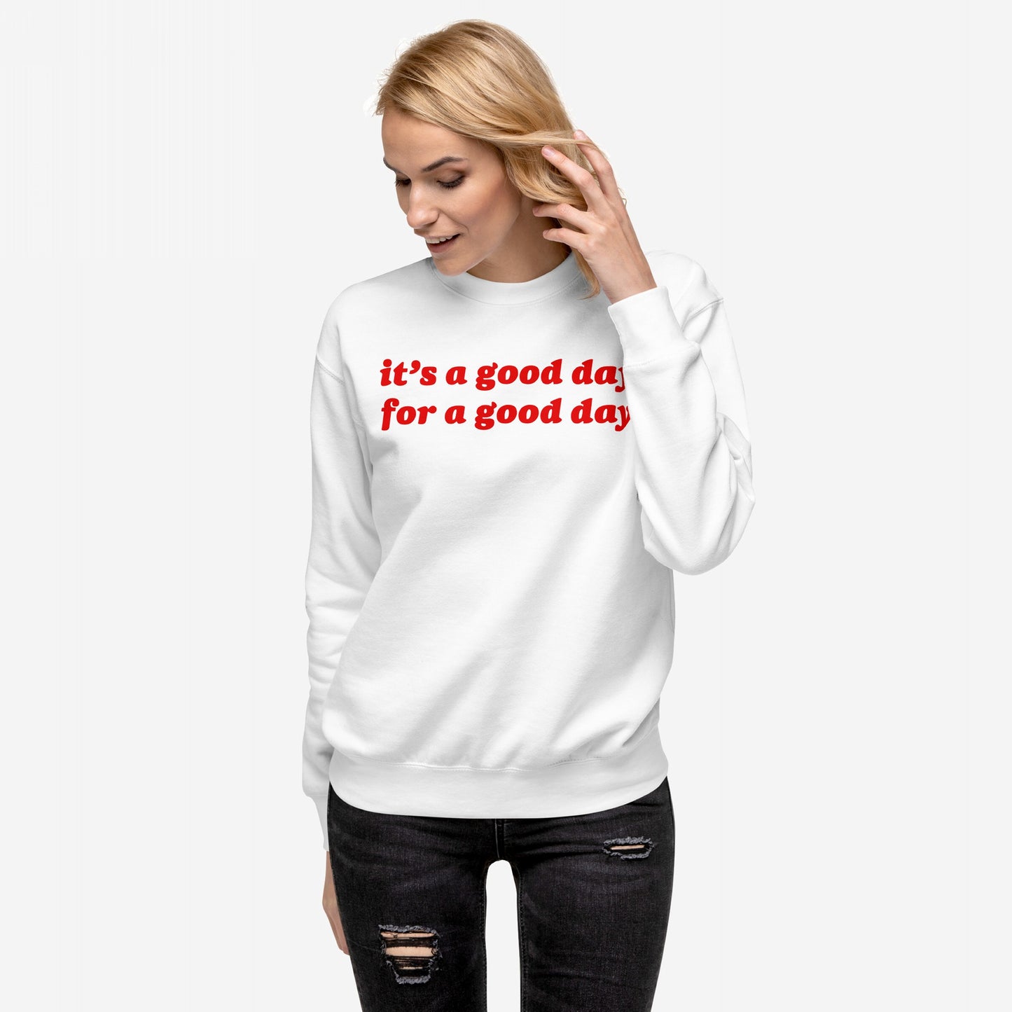 Good Day Hoodie & Sweatshirt modeled by a young woman, featuring it’s a good day for a good day in red, embodying positivity and style, paired with black distressed jeans.