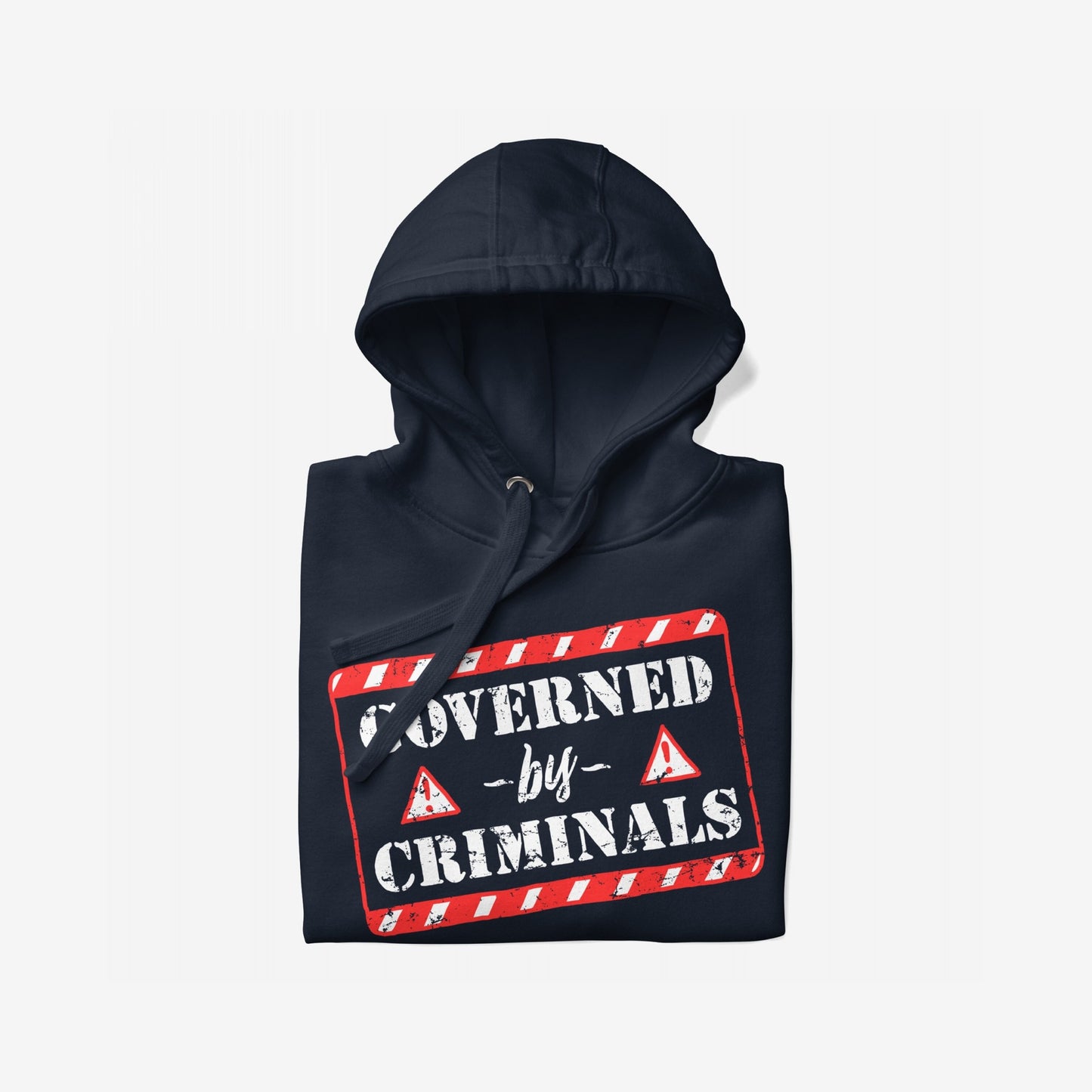 Folded Governed By Criminals Hoodie showcasing a distressed caution-tape graphic with GOVERNED by CRIMINALS message, surrounded by warning triangles, expressing defiance against corrupt authority and promoting bold activism.