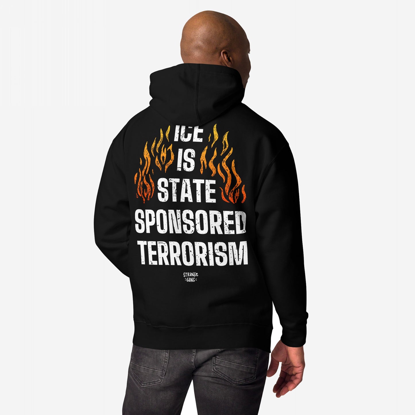 Back view of the ICE Is State Sponsored Terrorism Hoodie, featuring bold white text and stylized flames, embodying a powerful message of immigrant justice and resistance.