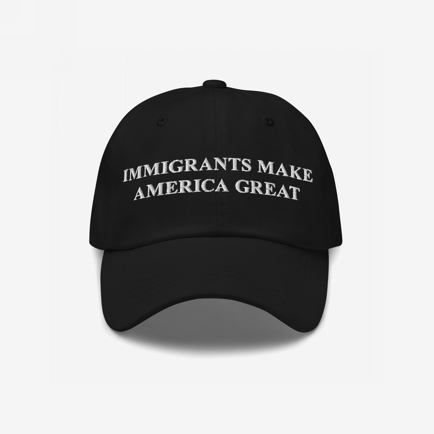 Black baseball-style cap with white embroidered lettering, IMMIGRANTS MAKE AMERICA GREAT, embodying a bold, anti-xenophobia message. Ideal for rallies or everyday use, supporting immigrant rights with style and conviction.