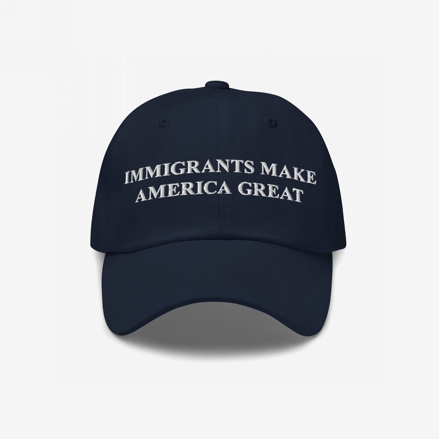 Navy-blue Immigrants Make America Great hat with bold white embroidery, embodying a strong message supporting immigrant rights and equality, suitable for rallies or daily wear.