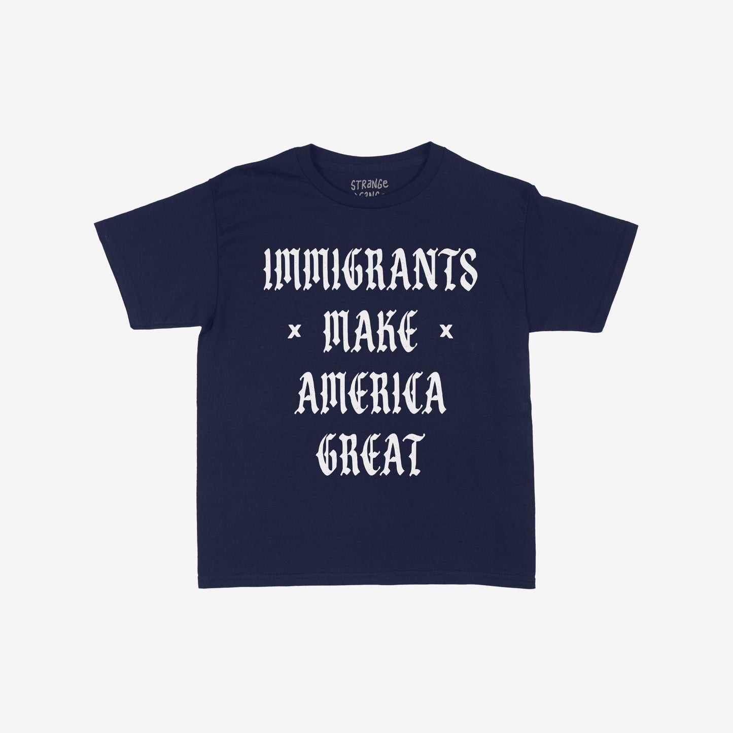 Immigrants Make America Great T-shirt featuring bold white Old English text on a navy-blue background, symbolizing solidarity and resistance against xenophobia and racism. Collar label reads “STRANGE GOODS.”