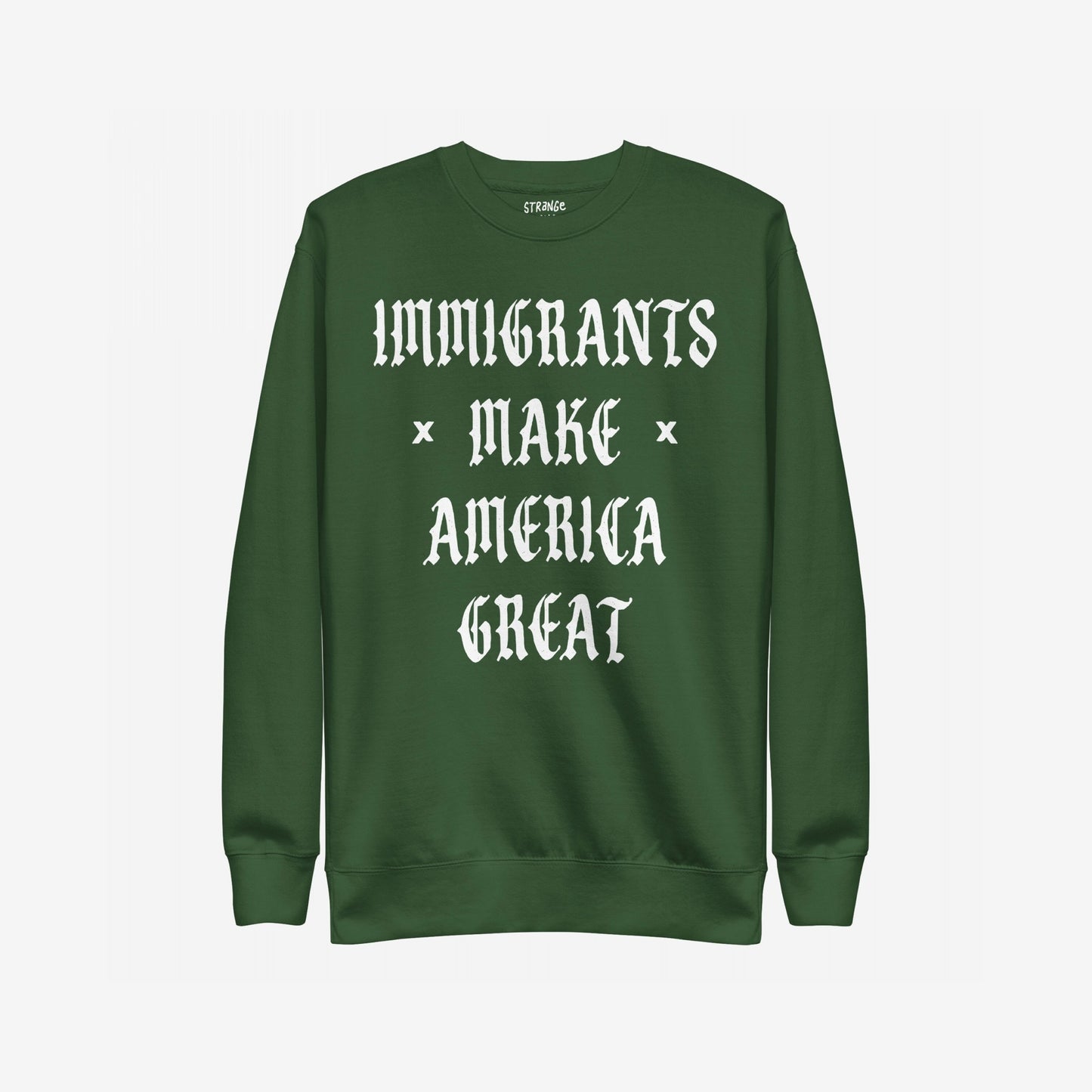Immigrants Make America Great Sweatshirt features a bold slogan in Gothic-style text, highlighting immigrant pride. Perfect for protests or daily wear, it challenges nationalism with unapologetic style.
