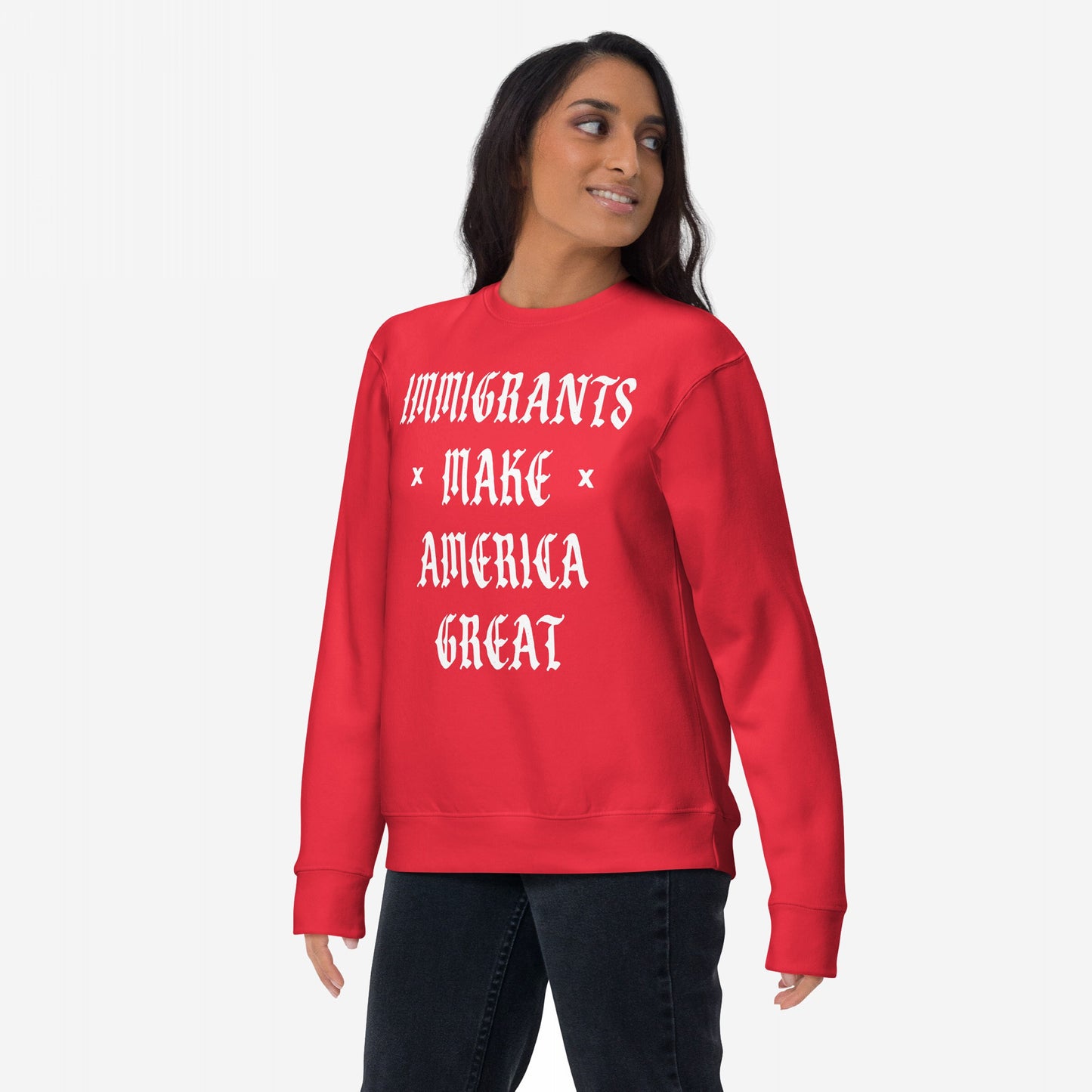 A woman wears the Immigrants Make America Great Sweatshirt with bold white Old English lettering, expressing immigrant pride against racism and nationalism, designed for marches or daily wear.