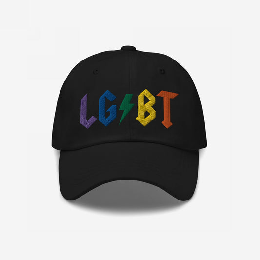 Black baseball cap titled LGBTQ Rocks Hat features LGBT in rainbow colors with a green lightning bolt, symbolizing pride and power. Available in multiple styles, supporting The Trevor Project.