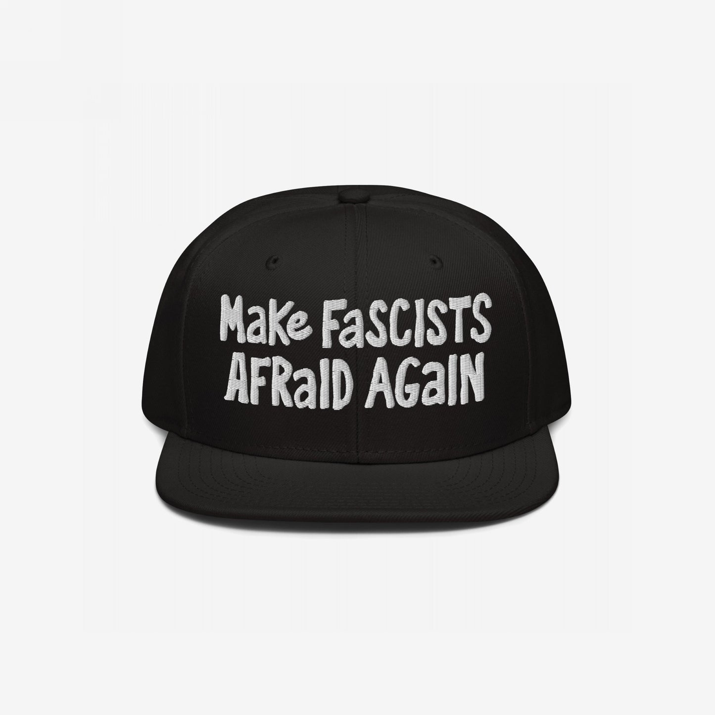 Black snap-back baseball cap with white embroidered text “Make Fascists Afraid Again,” capturing a bold stance against fascism. The cap embodies unapologetic resistance with its raw, hand-drawn lettering style.