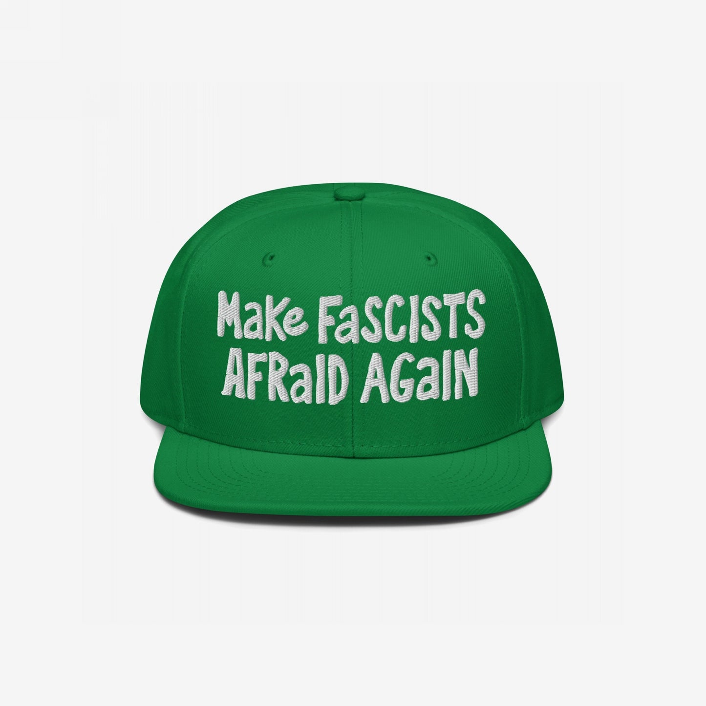 Green snap-back cap with bold white text reading Make Fascists Afraid Again, reflecting unapologetic resistance. Perfect for activism or everyday wear, supporting Amnesty International.