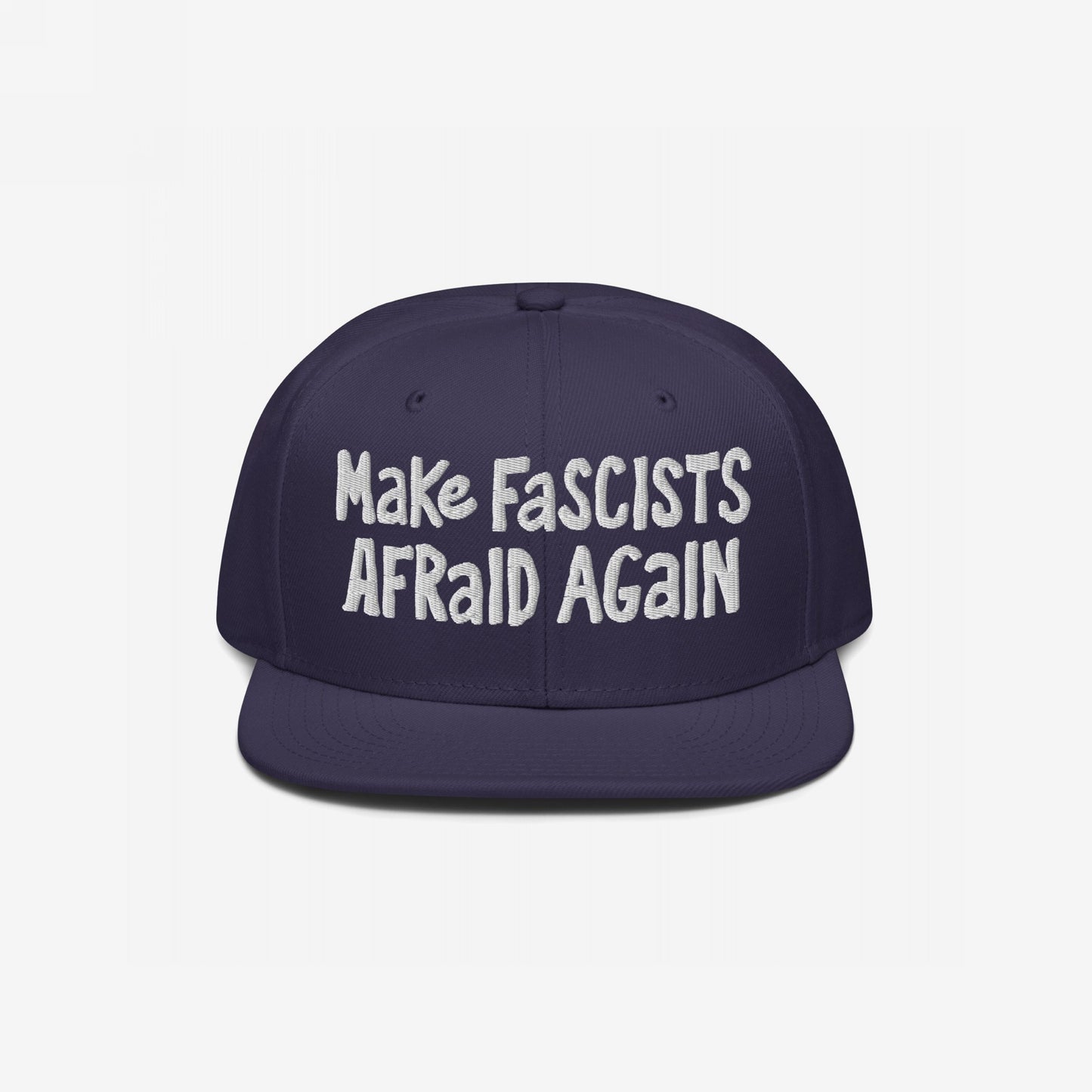 Dark-navy snapback cap with the slogan Make Fascists Afraid Again in white embroidery, embodying unapologetic resistance with bold, hand-drawn lettering. Ideal for activism or casual wear.