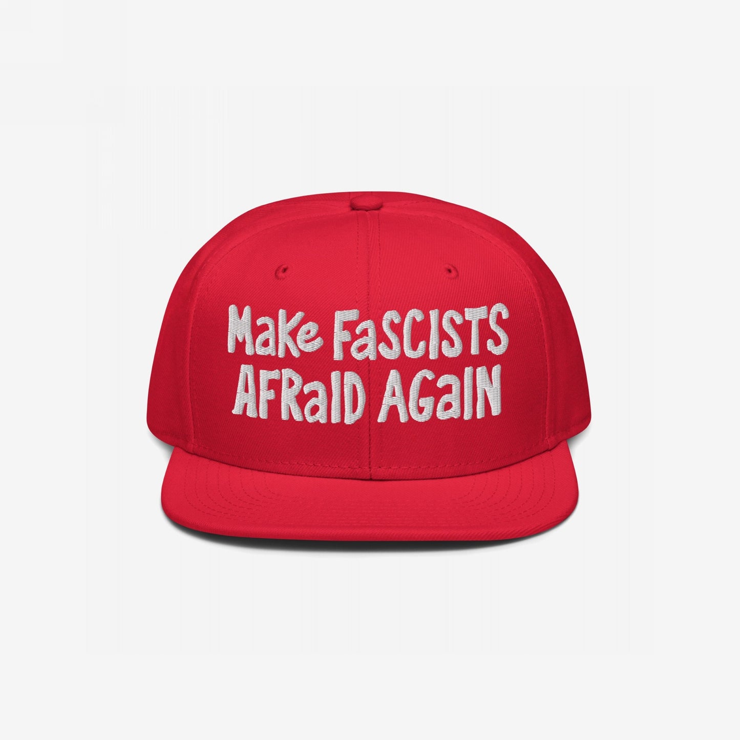 Red snapback cap with bold, white embroidered text: Make FASCISTS AFRAID AGAIN. A statement piece for unapologetic resistance, embodying defiance and activism.
