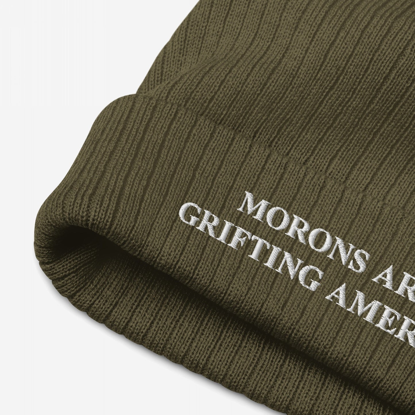 Olive-green rib-knit beanie featuring bold white embroidery Morons Are Grifting America. This straightforward, unapologetic design aligns with a message of political realism and direct action.