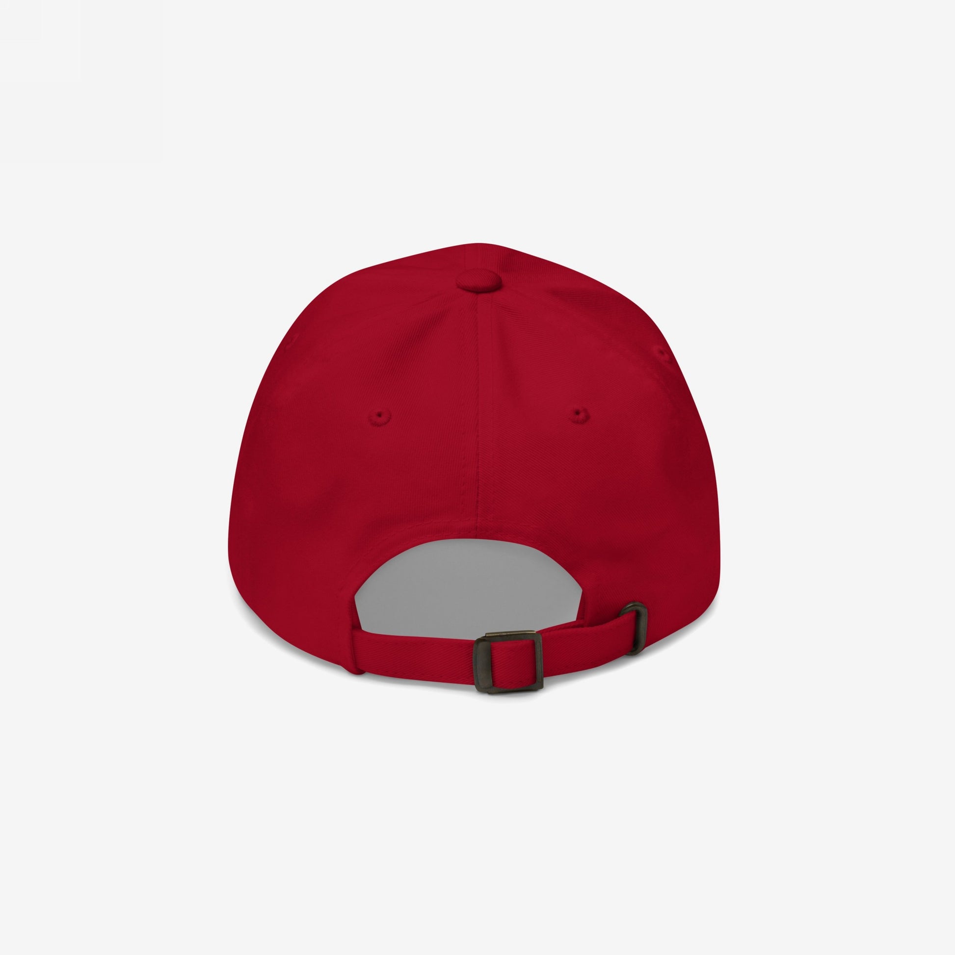 Rear view of the red dad hat with adjustable brass buckle and soft crown — a clean, functional design with sharp anti-MAGA front messaging.