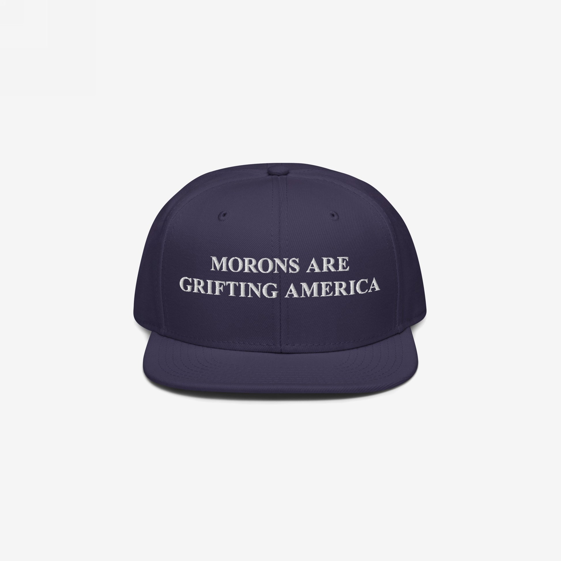 Navy blue snapback hat featuring white embroidered text "Morons Are Grifting America," delivering a clean and direct anti-MAGA message.