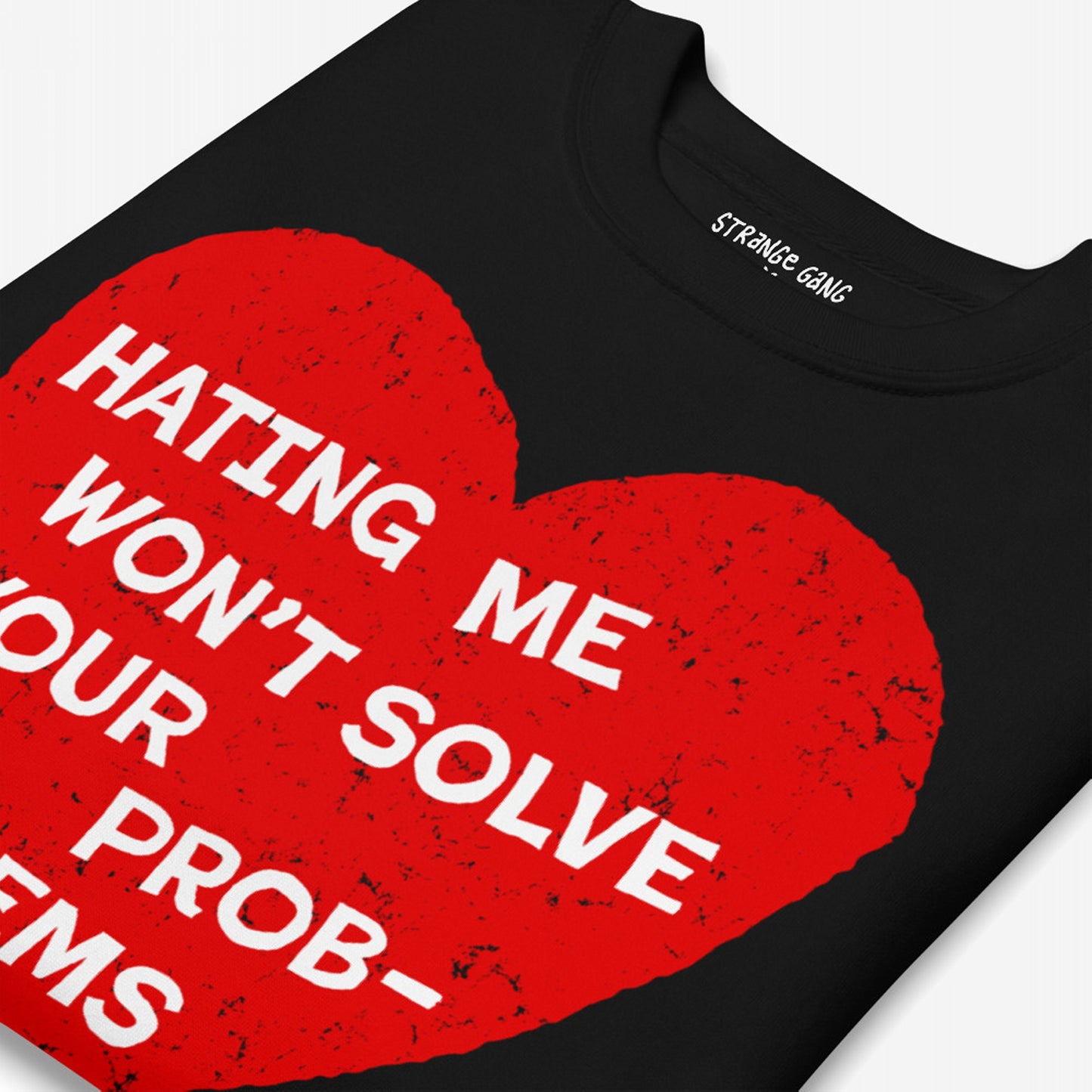 No Hate Hoodie & Sweatshirt features a bold red heart with “HATING ME WON’T SOLVE YOUR PROBLEMS” slogan, embodying a defiant stance on equality and resistance.