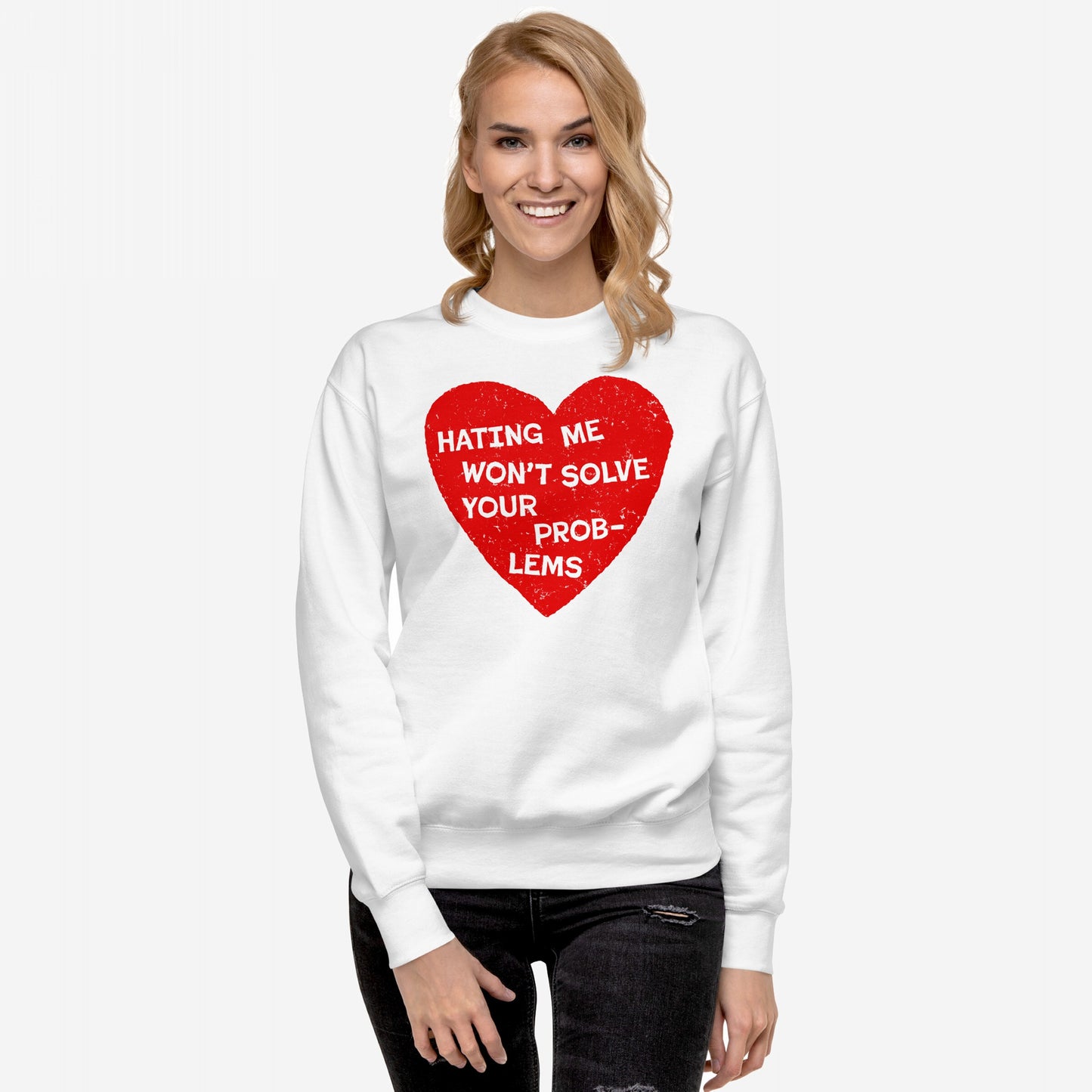 Woman in a No Hate Hoodie & Sweatshirt featuring a distressed red heart with the message “HATING ME WON’T SOLVE YOUR PROBLEMS,” symbolizing support for LGBTQ rights and immigrant dignity.