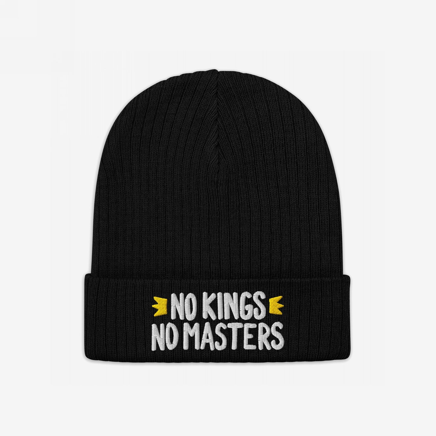 Black knit beanie with NO KINGS NO MASTERS embroidered in white, accented by yellow crowns. This No Kings No Masters Hat embodies rebellion and equality, supporting Amnesty International.