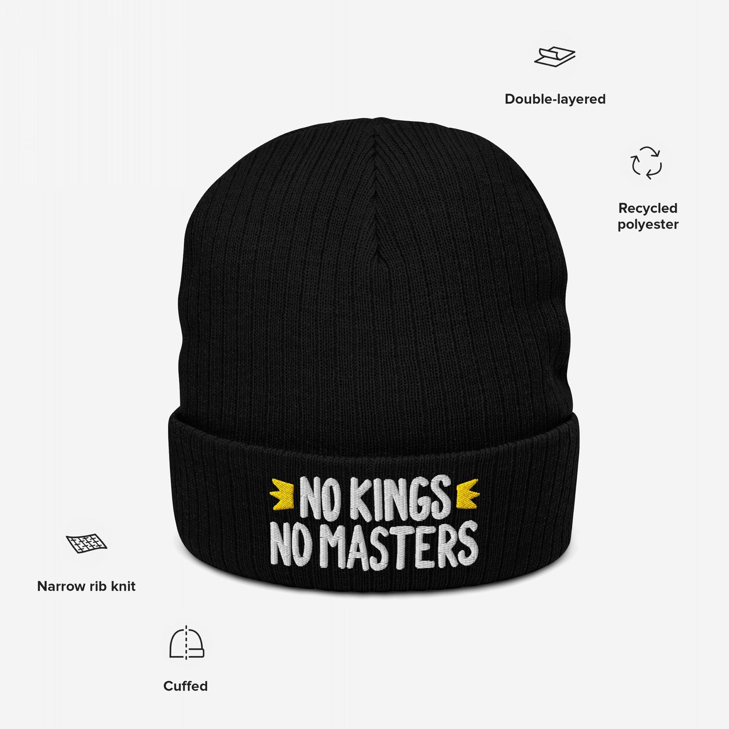 No Kings No Masters Hat: Black cuffed knit beanie with white embroidered slogan, highlighting rebellion. Features include double-layered recycled polyester, narrow rib knit, and cuffed design. Supports Amnesty International.