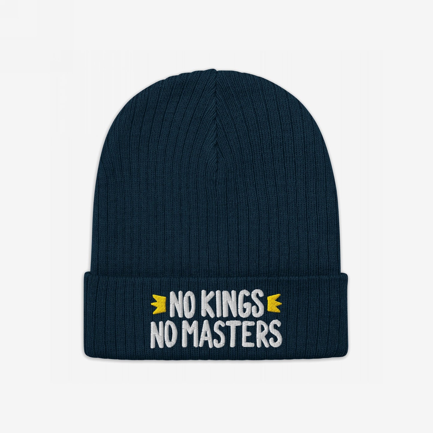 Dark blue knitted beanie titled No Kings No Masters Hat, featuring white embroidered text and yellow crowns, symbolizing rebellion and equality with bold style.