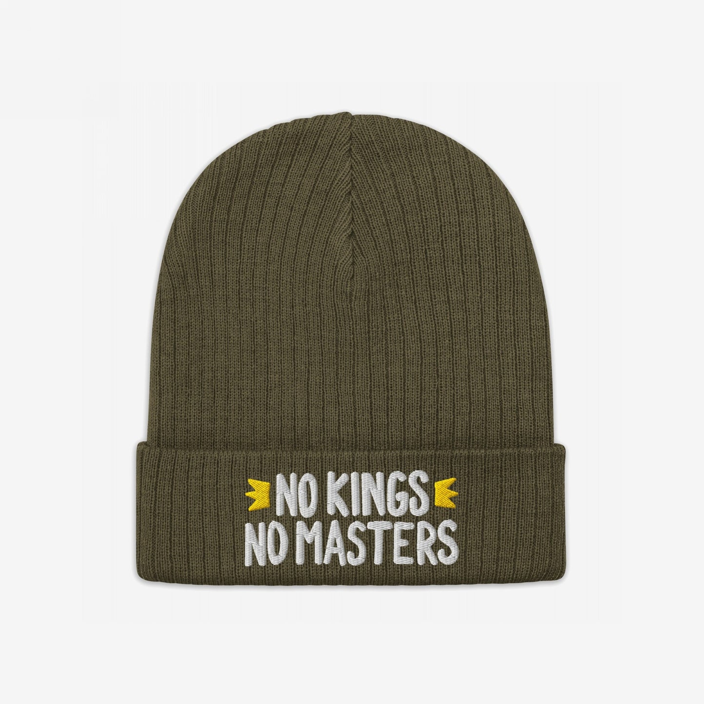 The No Kings No Masters Hat is an olive-green, ribbed knit beanie with a folded cuff, featuring white embroidered text and two yellow crown motifs, embodying rebellious style and anti-authoritarian sentiment.